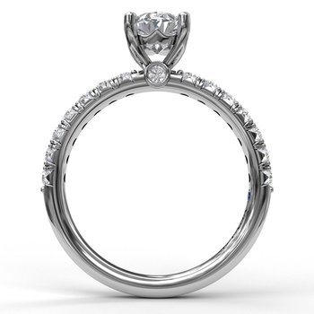 Oval Cut Solitaire With French Cut Pave