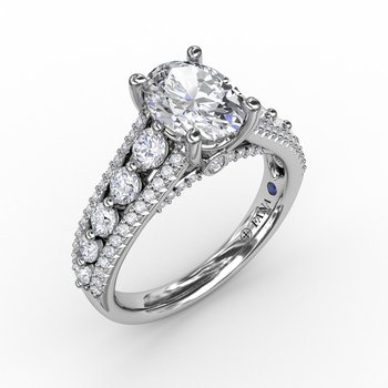 Classic Oval Diamond Solitaire Engagement Ring With Triple-Row Diamond Band